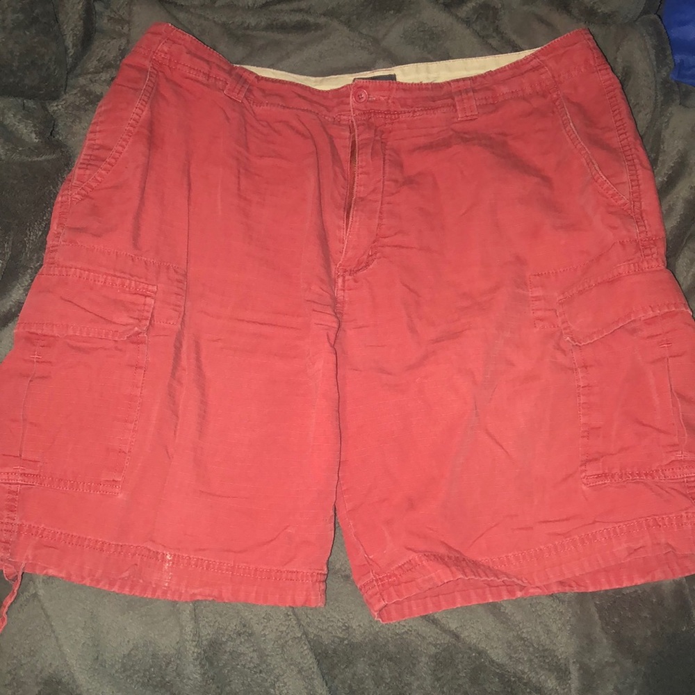 Red shorts with a couple flaws.